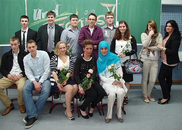 Eine Schulklasse vor einer Tafel